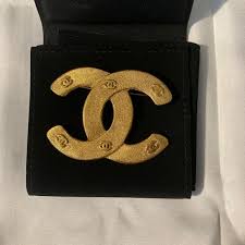 gold chanel brooch