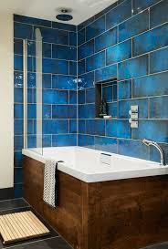 Blue hexagon tiles on the shower wall create an accent in the bathroom while smaller white hex tiles on the floor bringing mosaic appeal. 97 Cool Blue Bathroom Design Ideas Digsdigs