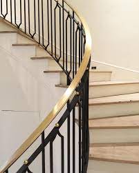 Design By Jenkins Interiors Curved Brass And Iron Handrail Custom Design By Jerkin Interiors Staircase Design Handrail Design Staircase Railing Design