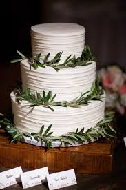 Simple Three Tier Wedding Cake With Greenery Rings Wedding Cake Greenery Winter Wedding Cake Gold Wedding Cake