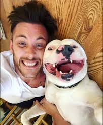 Police threaten to take adopted dog from new home in reaction to viral  photo