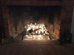 Your Fireplace Sans Fire Diy Christmas Lights Hanging Christmas Lights Decorating With Christmas Lights