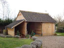 Green Oak Garage Cart Lodge Green Oak Barn With Log Store Timber Frame Building Carport Green Oaks