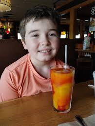 Cafe with young people and good strawberry smoothie