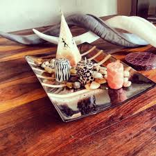 Pin By Steve Smith On Interior Paradise Coffee Table Centerpieces African Home Decor Animal Print Candles