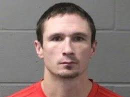 Man charged with kidnapping after allegedly killing dog, assaulting man