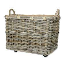 Hand woven rattan baskets on wheels. Grey Buff Rattan Wheeled Log Basket The Basket Company