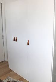 We can supply a wide range of detailing services to make your ikea pax wardrobe doors look exactly the we are able to provide ironmongery to suit all your requirements, from handles, to hinges, to wardrobe accessories. Diy Leather Cabinet Pulls Ikea Wardrobe Dombas Wardrobe Closet Door Handles