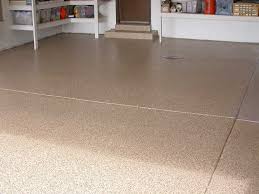 Long gone are the days of raw, unfinished concrete floor surfaces, once the mainstay of commercial and industrial buildings. Finished Garage Floor With Epoxy Polyaspartic Coating System For Garages