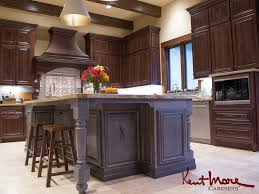 Vaulted cathedral ceilings, oak kitchen cabinets and granite kitchen countertops. Custom Kitchen Cabinets Texas Kent Moore Cabinets