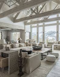 Light natural wood flooring, day bed style white frame sectional and small rug under a little coffee table. 25 Vaulted Ceiling Ideas With Pros And Cons Digsdigs