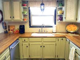 Finally Finished Cream Painted Kitchen Cabinets Green Kitchen Cabinets New Kitchen Cabinets