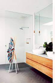 white walls grey floor timber vanity herringbone floor bathroom inspiration flooring inspiration