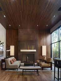 How about going vertical instead of horizontal? 20 Rooms With Modern Wood Paneling Modern Living Room Interior Living Room Design Modern Interior Architecture