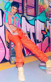 By signing up, i agree to the terms & to receive emails from popsugar. Karl Kani Orange Cargo Pants 90s Themed Outfits 90s Fashion Outfits Hip Hop 90s Outfit Party Hip Hop
