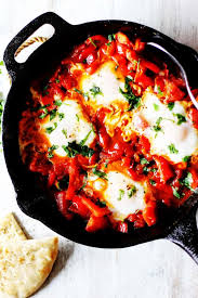Chorizo & grits breakfast bowls. Shakshuka Classic Mediterranean Breakfast Eating European