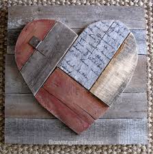 Apply decoupage glue to photos and wood to create inexpensive personalized decorations for your family and friends. Rustic Pallet Wood Valentines Heart Scavenger Chic