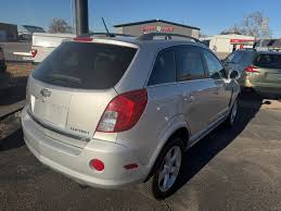 Image result for Silver Topaz 2013 Captiva