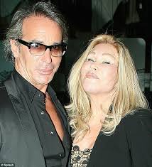 Catwoman Jocelyn Wildenstein and beau Lloyd Klein take their pumped up lips  out for dinner