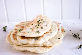 Divide the dough into six equal portions and roll out into flat discs. Greek Pita Bread Eat Yourself Greek