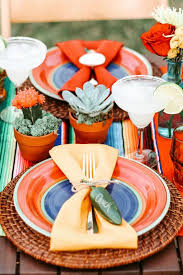 Wrap balusters, columns, fence posts/rails, and/or tree trunks in fabric strips of different festive colors. Mexican Party Ideas Tablescape Celebrations At Home