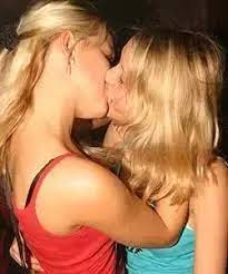 Happy young handsome father sitting on sofa, holding on lap small children daughters, enjoying tender sweet moment at home. How To Make Out With A Girl At Club If I Am A Girl Quora