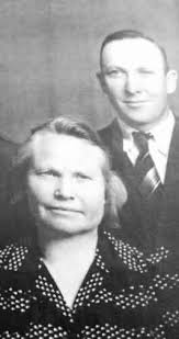 The woman in this picture who's name is Nikolai Aarhus in the early 1900's.  Any of you that still live in the Devils Lake area recognize the woman or  even the name?