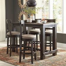 1 table and 4 chairs. Drewing Bar Table Set By Signature Design By Ashley Furniturepick