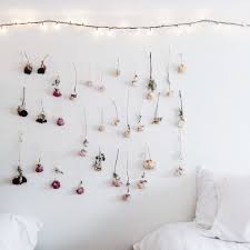 First, you have to decide if you want to buy one of those fabric models or make your own. 13 Pretty Things To Do With Those Dried Flowers You Ve Been Saving Creative Wall Decor Flower Wall Decor Flower Wall