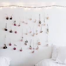 My granny always taught me to hold flowers upside down so the juices wouldn't come out so easily. 13 Pretty Things To Do With Those Dried Flowers You Ve Been Saving Creative Wall Decor Dried Flower Wall Hang Dry Flowers
