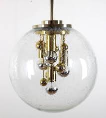 Designed by eduardo alcalde, based on the original 1964 modular construction system by antonio carrillo. Large Doria Globe Pendant Light Glass And Brass 1970 For Sale At 1stdibs