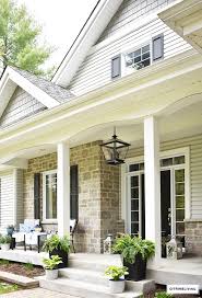 Love farmhouse and boho inspired decor like i do? Spring Porch Decorated With Blue And White Accents