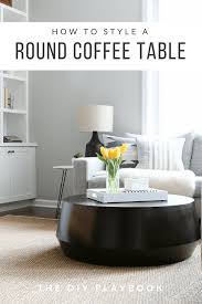 White acrylic stone, marble, oak, ebony or lacquered mdf. Tips To Style A Round Coffee Table In Your Living Room The Diy Playbook