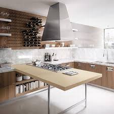Even a narrow console can work as a spot to set tools and ingredients on while you cook. Walnut Kitchen Furniture The Barrique Collection