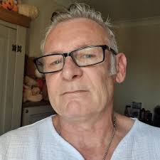 Should you be able to hear a very slight buzzing noise from speakers when  the amp is set at low volume with no music playing?