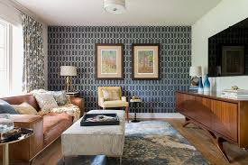 The neutral linen shades of the rug, table, and couches go with the flow and provide a soft backdrop to the blues. 25 Awesome Rooms That Inspire You To Try Out Geometric Wallpaper