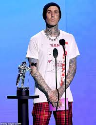 The photo was posted on instagram without a caption, but travis' black heart emoji. Travis Barker Once Revealed He Had A Crush On Kim Kardashian As Romance With Kourtney Heats Up Daily Mail Online