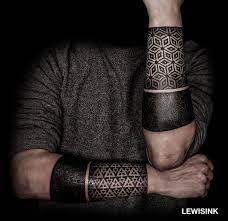 Tribal tattoos are very popular today. Guy S Double Forearm Piece Thick Black Bands And Intricate Geometric Patterns Tattoo By Lewisink An Artist Based All Black Tattoos Tattoos Black Ink Tattoos