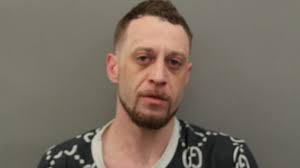 Owner of unlicensed Cook County dispensary charged after allegedly  brandishing gun in store