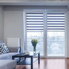 Stationary drapes soften the modern lines in hunter douglas' duette honeycomb shades. Product Page Window Treatments Window Coverings Sunburst Shutters
