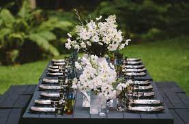 Two goblets are set at a casual dining arrangement: 28 Dinner Party Table Setting Ideas To Impress Your Guests