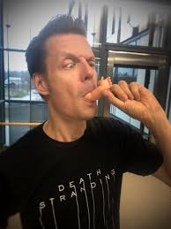 Why is Sam Lake eating a plastic baby?