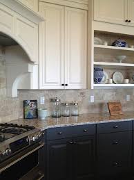 White Upper Cabinets With Charcoal Base Cabinets Bronze Hardware Kitchen Remodel Upper Cabinets Blue Cabinets