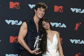 Camila cabello first met whilst on tour when they were both openings for austin mahone , but wasn't close until they met backstage at a taylor swift concert and wrote: Shawn Mendes Opens Up About Dating Camila Cabello
