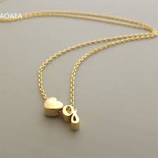 I wanted to make a necklace out of my lucky coin, but i cant seem to find anything that tells how to do it without making a hole or soldering to the coin. Tiny Gold Cursive Initial Necklace Dainty Lowercase Initial Letter Necklacestainless Steel Name Gift Bridesmaid Gift Pendant Necklaces Aliexpress