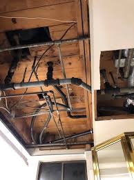 Then, using the same method, hang the larger and full sheets of drywall. Convert Drop Ceiling To Drywall But With Plumbing Access Home Improvement Stack Exchange