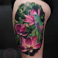 But getting this flower as your tattoo with massive petals is extremely wild. Tattoo Uploaded By Liz Venom Tattoo By Liz Venom Lizvenom Tattoodoambassador Color Realism Realistic Photorealism Hyperrealism Lotus Flower Nature Floral Hummingbird Bird Animal 836957 Tattoodo
