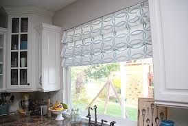 These are faux shades, but they look just as good. Roman Curtain