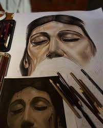 Retrato realista con lápices de colores del Cristo yacente del calvario.  Artista: Josué Avila