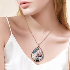 Michelle is modeling her first tree of life pendant. Amazon Com Sunyik Teardrop Rainbow Abalone Shell Tree Of Life Pendant Necklace Clothing